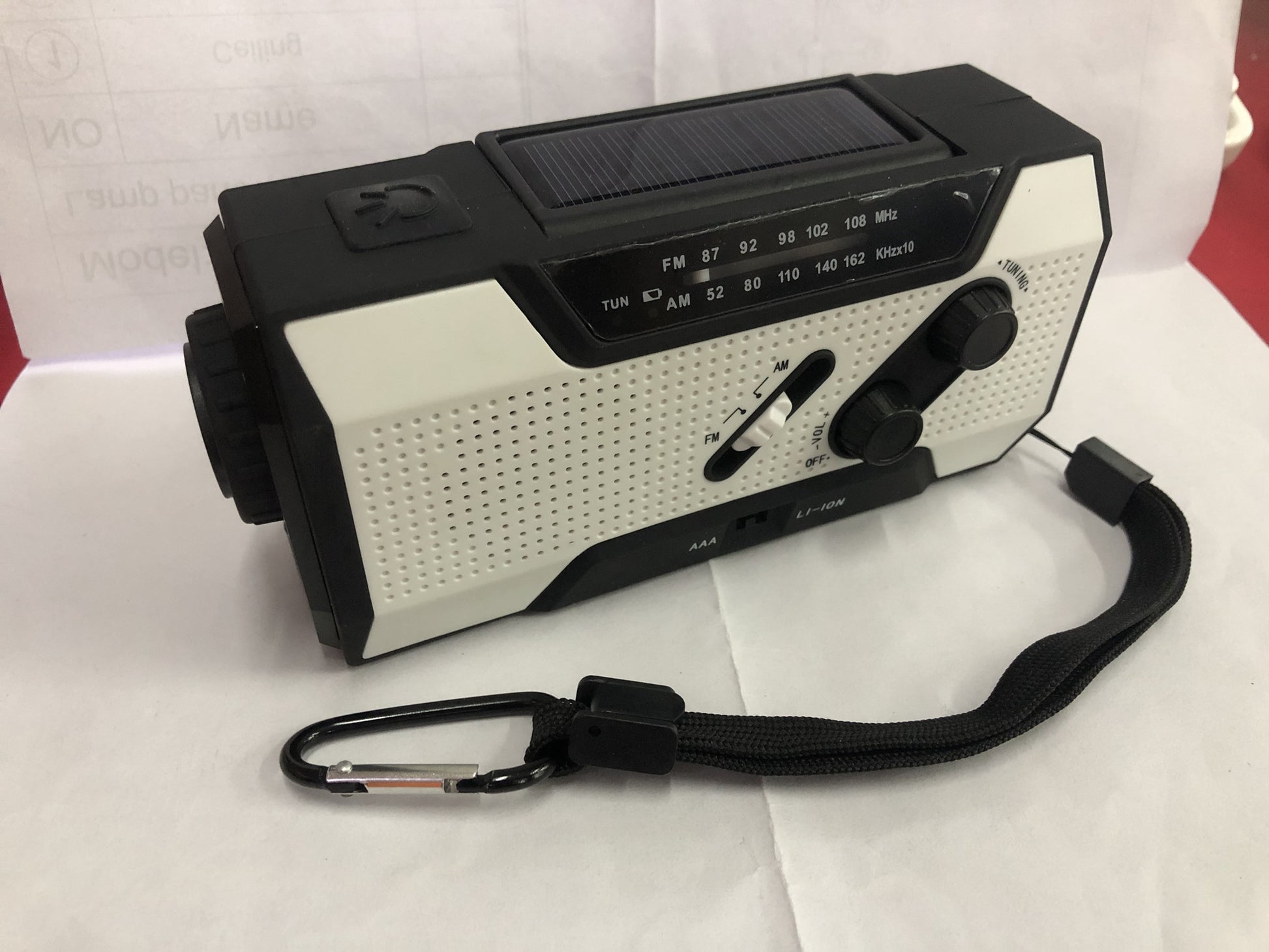 JMT-154698 Hand Crank Solar-Powered Emergency Radio with USB Charging and LED Flashlight