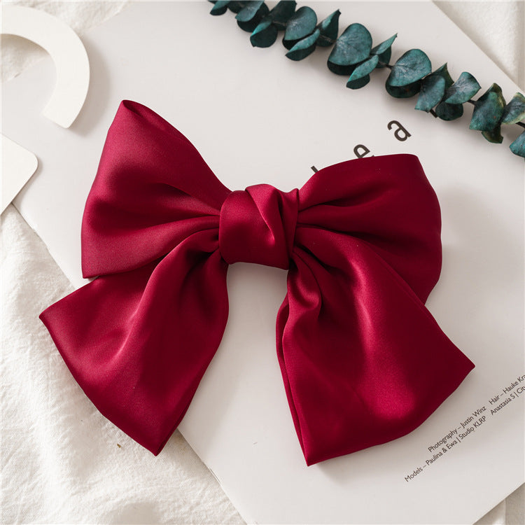 JMT-265226 Elegant Bow Hair Clip in Tribute Silk with Alloy Detailing and Elastic Band, Perfect for Special Occasions
