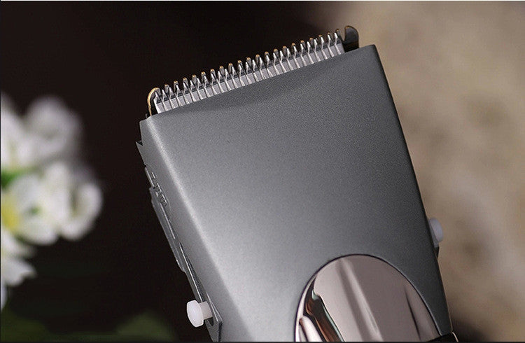 JMT-542730 Silent High-Speed Hair Clipper with Stainless Steel Blades – Compact and Convenient Grooming Tool