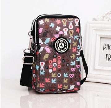 JMT-801866 Vertical Oxford Phone Bag with Zipper Closure and Multiple Floral Prints