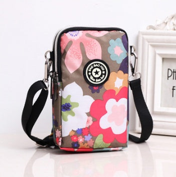 JMT-801866 Vertical Oxford Phone Bag with Zipper Closure and Multiple Floral Prints