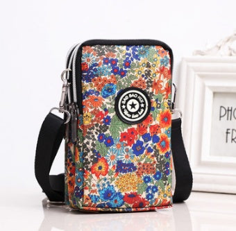 JMT-801866 Vertical Oxford Phone Bag with Zipper Closure and Multiple Floral Prints