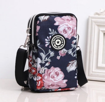 JMT-801866 Vertical Oxford Phone Bag with Zipper Closure and Multiple Floral Prints