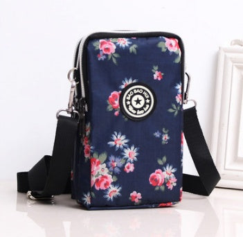 JMT-801866 Vertical Oxford Phone Bag with Zipper Closure and Multiple Floral Prints