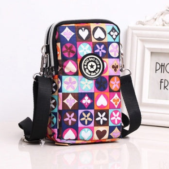 JMT-801866 Vertical Oxford Phone Bag with Zipper Closure and Multiple Floral Prints