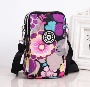 JMT-801866 Vertical Oxford Phone Bag with Zipper Closure and Multiple Floral Prints
