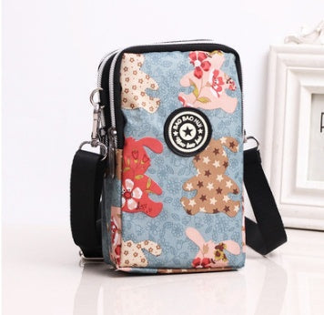 JMT-801866 Vertical Oxford Phone Bag with Zipper Closure and Multiple Floral Prints