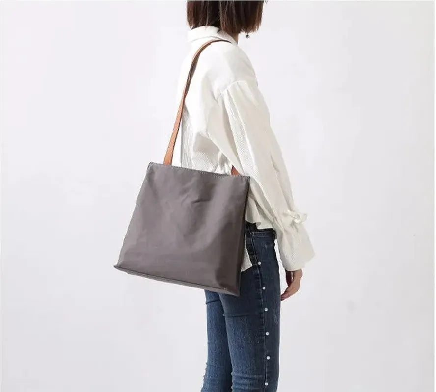 JMT-886666 Durable Leather and Canvas Crossbody Bag with Adjustable Shoulder Strap, Retro Design