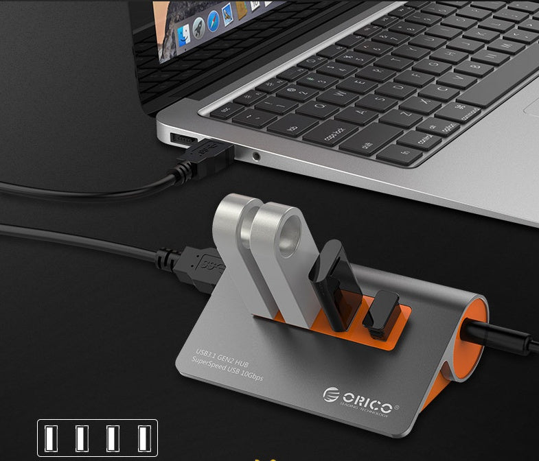 JMT-894666 Aluminum Alloy Laptop Hub with 4 USB 3.1 Ports and Power Supply in Dark Gray and Orange
